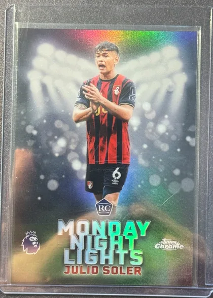 Front of 2025-26 Topps Chrome Premier League Julio Soler #MNL-17 Base, upright portrait soccer card. A player in a red-and-black striped AFC Bournemouth kit is pictured centrally against a blurred stadium scene with…