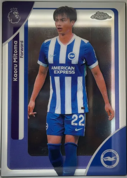 Front of 2025-26 Topps Chrome Premier League Kaoru Mitoma #45, portrait-format soccer card front. A full-body image of Kaoru Mitoma in a blue-and-white Brighton & Hove Albion kit occupies the center. The left…
