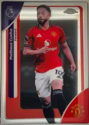 Front of 2025-26 Topps Chrome Premier League Matheus Cunha #134 Base, portrait soccer player card. Matheus Cunha is shown full-length in a red Manchester United kit against a dark photographic background. The player…