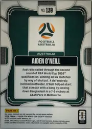 Back of 2026 Panini Prizm FIFA Aiden O’Neill #139 Base, upright portrait-oriented card back. A dark green field is framed by rounded white decorative border lines. At the top center is a white label…