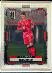 Front of 2026 Panini Prizm FIFA HEUNG-MIN SON #282 Base, upright portrait soccer card. A full-body image of Heung-Min Son in a red Korea Republic kit appears against a stadium background. The upper center…