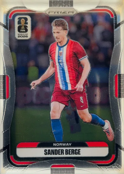 Front of 2026 Panini Prizm FIFA Sander Berge #328, front of a portrait soccer card. A full-body image of Sander Berge in a red Norway kit occupies the center. The FIFA World Cup 2026 emblem appears…