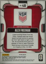 Back of 2026 Panini Prizm FIFA Soccer Cards Alex Freeman #433 Prizm (refractor), portrait-oriented card back. Card number appears in a small white rounded box at the top center. A USA shield occupies the upper middle above a red…