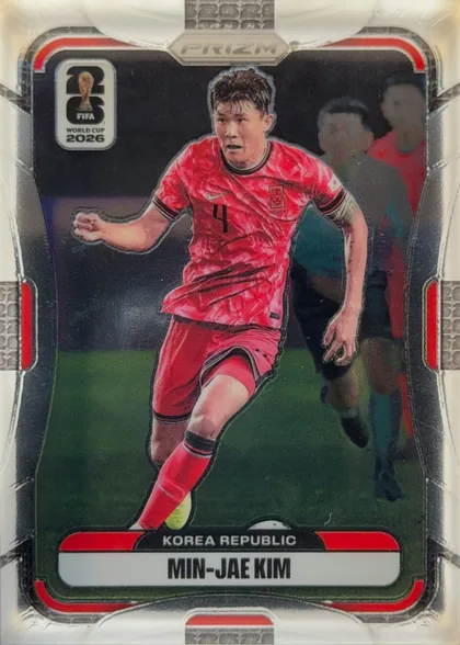 Front of 2026 Panini Prizm FIFA Soccer Cards MIN-JAE KIM #278, front-oriented portrait soccer card. A player in a red Korea Republic uniform is shown running on a dark stadium background. A FIFA World Cup 2026…