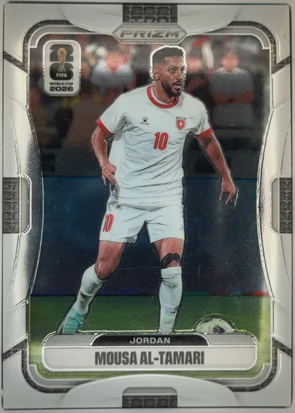 Front of 2026 Panini Prizm FIFA Soccer Cards Mousa Al-Tamari #270 Prizm, portrait-format soccer card front. A full-body action photograph shows Mousa Al-Tamari in a white Jordan kit with red trim and number 10, against a…