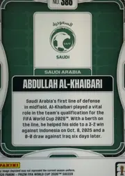 Back of 2026 Panini Prizm FIFA World Cup Soccer ABDULLAH AL-KHAIBARI #586, upright portrait-oriented card back. A dark green field is enclosed by a white rounded border and decorative white curved corner elements. At the…