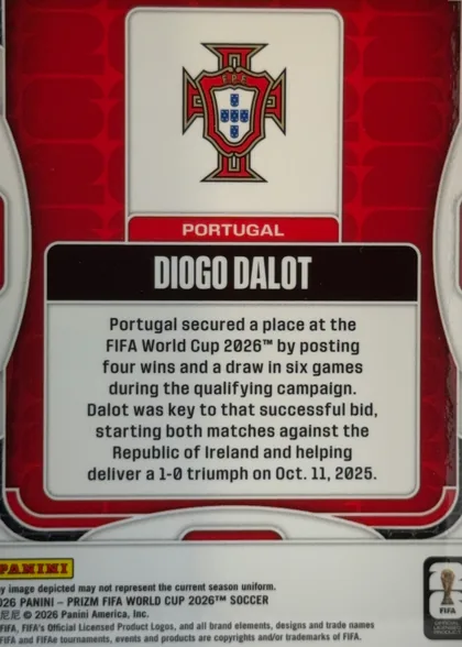 Back of 2026 Panini Prizm FIFA World Cup Soccer Diogo Dalot Base, portrait-oriented card back. A Portugal crest appears in a large white rounded panel near the top, with PORTUGAL in white lettering on a red bar…