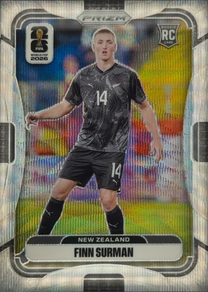 Front of 2026 Panini Prizm FIFA World Cup Soccer Finn Surman #523, portrait soccer card front. A full-body image of Finn Surman in a dark New Zealand kit with number 14 occupies the center. A FIFA World Cup 2026…
