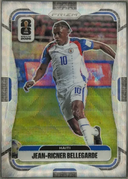 Front of 2026 Panini Prizm FIFA World Cup Soccer Jean-Ricner Bellegarde #236 Base, portrait-format soccer card front. A full-body action photograph shows a player in a white Haiti kit with blue and red accents, running on a soccer…