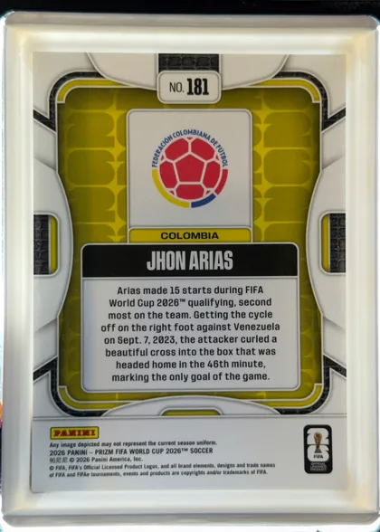 Back of 2026 Panini Prizm FIFA World Cup Soccer JHON ARIAS #181, back of a vertically oriented soccer card. Card number "NO. 181" is centered near the top. A Colombian football federation crest appears in a white…