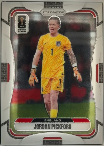 Front of 2026 Panini Prizm FIFA World Cup Soccer Jordan Pickford #111, portrait-oriented soccer card front. A full-body image of Jordan Pickford in a yellow England goalkeeper uniform stands against a dark stadium…