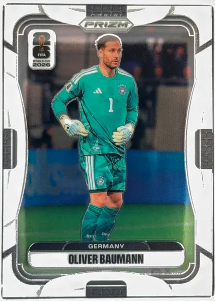 Front of 2026 Panini Prizm FIFA World Cup Soccer Oliver Baumann #54, portrait soccer card front. A goalkeeper in a green Germany kit stands centered in a stadium scene. The top has PANINI and PRIZM branding, the…