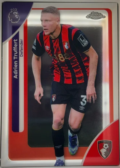 Front of 2026 Topps Chrome Premier League Adrien Truffert #10 Base, portrait football card front showing Adrien Truffert in an AFC Bournemouth red-and-black striped kit. His name appears vertically on the dark purple…