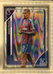 Front of 2026 Topps Chrome Premier League Soccer Cards Daniel Muñoz #80 Base, front of a soccer card shown rotated 90 degrees. A player in a red-and-blue striped Crystal Palace home kit with '388' sponsor and number 2 on the…
