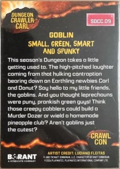 Back of Playmates Dungeon-Crawler-Carl GOBLIN #SDCC.09, back of a portrait-orientation collectible card with a dark charcoal/black background. Top-left corner holds a rocky-textured gold logo reading…